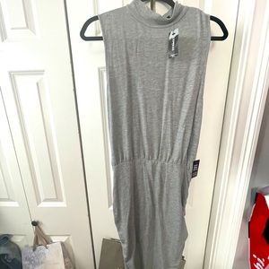 Cute versatile grey dress! Great for work under a blazer or evening out!